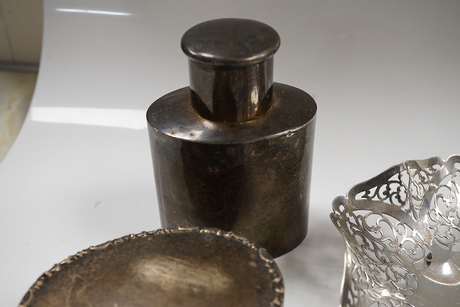 Sundry small silver including an Edwardian oval tea caddy, Hasseler Brothers, London, 1901, 10.4cm, a pierced bonbon dish, a late Victorian cream jug, five napkin rings including two pairs, a seven bar toast rack, a dama